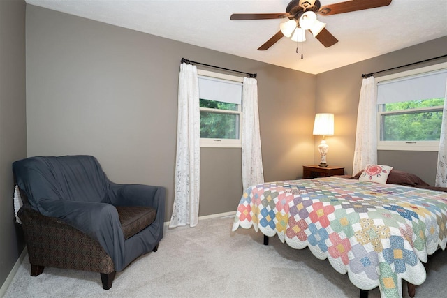 212 Rebecca Ln, Normal, IL 61761 - bedroom featuring light colored carpet and a ceiling fan