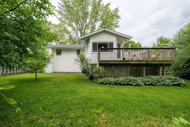 212 Rebecca Ln, Normal, IL 61761 - back of property with a deck and a lawn