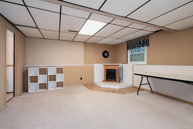 212 Rebecca Ln, Normal, IL 61761 - below grade area featuring carpet floors, a fireplace, and a drop ceiling