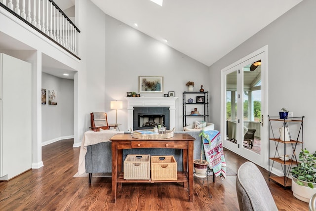 17526 W Windhaven Ct, Grayslake, IL 60030 - living area with wood finished floors, a tile fireplace, high vaulted ceiling, and recessed lighting