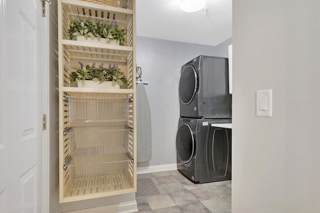17526 W Windhaven Ct, Grayslake, IL 60030 - laundry area with estacked washer and dryer and baseboards
