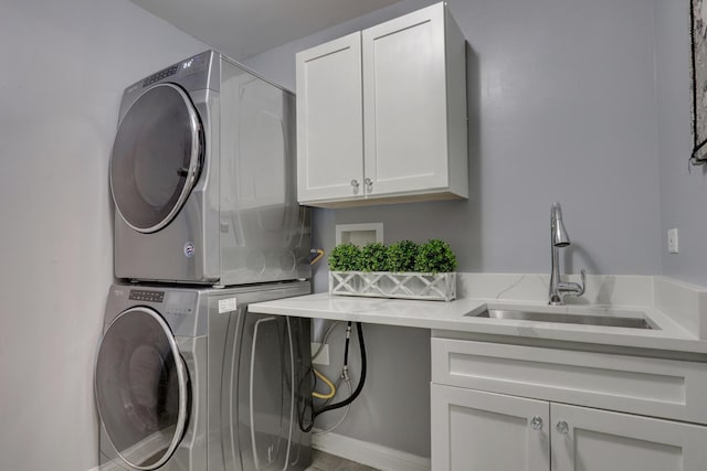 17526 W Windhaven Ct, Grayslake, IL 60030 - laundry room featuring estacked washer and dryer and cabinet space