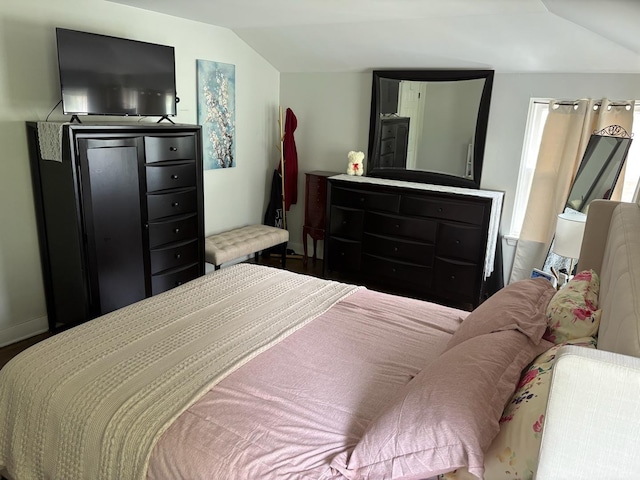 2119 S 20th Ave, Broadview, IL 60155 - bedroom featuring lofted ceiling and baseboards