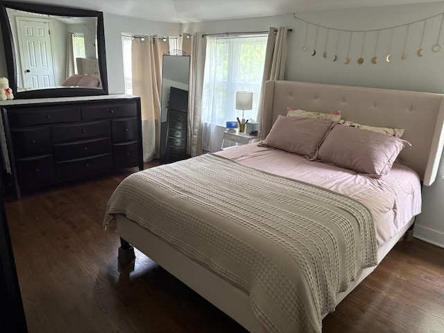 2119 S 20th Ave, Broadview, IL 60155 - bedroom with dark wood-style floors