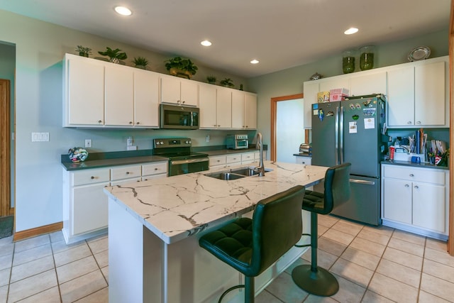 305 Orchard Ln, Beecher, IL 60401 - kitchen featuring appliances with stainless steel finishes, white cabinets, light tile patterned flooring, and recessed lighting