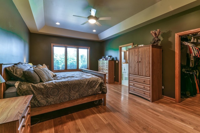 305 Orchard Ln, Beecher, IL 60401 - bedroom featuring a spacious closet, a raised ceiling, wood finished floors, a closet, and recessed lighting