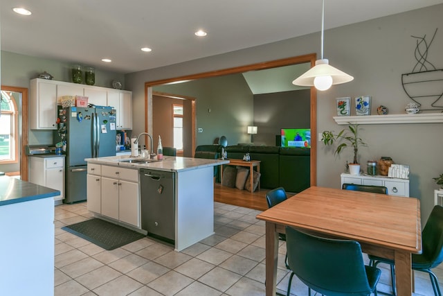 305 Orchard Ln, Beecher, IL 60401 - kitchen featuring stainless steel appliances, white cabinetry, recessed lighting, light tile patterned floors, and decorative light fixtures