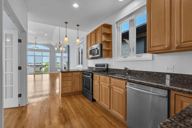 7153 W Irving Park Rd Unit 3, Chicago, IL 60634 - kitchen featuring appliances with stainless steel finishes, plenty of natural light, light wood-style floors, open shelves, and recessed lighting