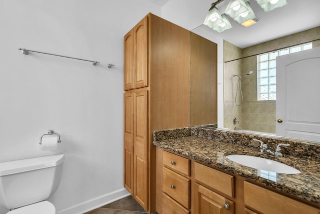 7153 W Irving Park Rd Unit 3, Chicago, IL 60634 - bathroom featuring vanity, tile patterned floors, and tiled shower / bath