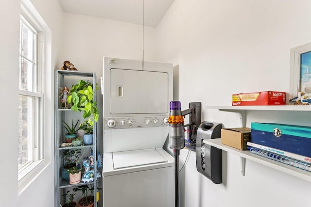 5639 W Cornelia Ave, Chicago, IL 60634 - laundry area featuring stacked washer / dryer