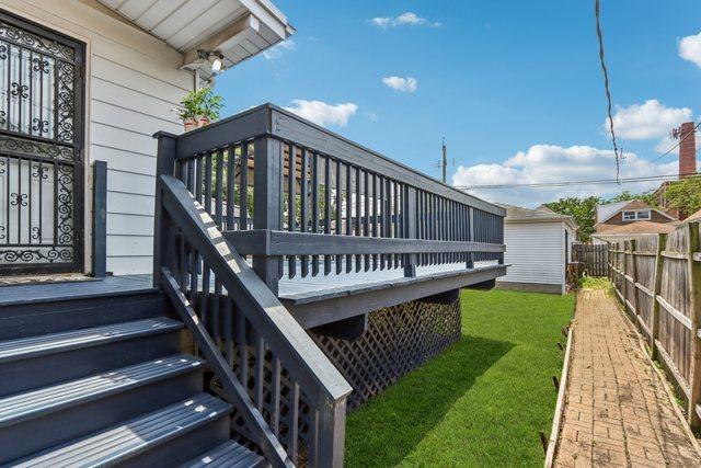 5639 W Cornelia Ave, Chicago, IL 60634 - deck with a fenced backyard