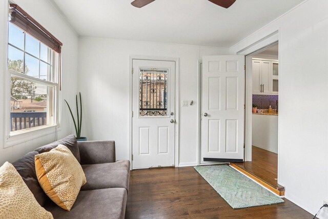 5639 W Cornelia Ave, Chicago, IL 60634 - foyer entrance featuring a ceiling fan and dark wood-type flooring