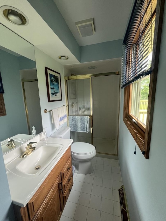 24005 S Green Heron Dr, Channahon, IL 60410 - full bath featuring tile patterned flooring, vanity, and a stall shower