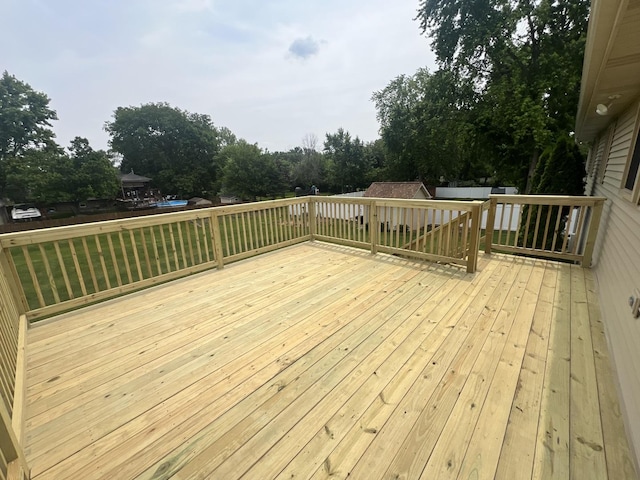 24005 S Green Heron Dr, Channahon, IL 60410 - wooden deck featuring an outbuilding