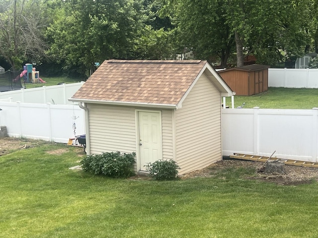 24005 S Green Heron Dr, Channahon, IL 60410 - view of shed with a fenced backyard