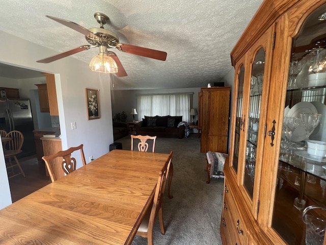 24005 S Green Heron Dr, Channahon, IL 60410 - carpeted dining room featuring ceiling fan and a textured ceiling