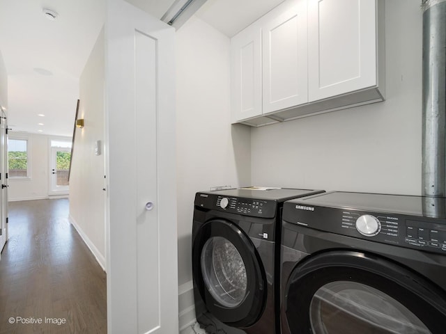 4030 N California Ave Unit 3, Chicago, IL 60618 - washroom with cabinet space, washing machine and clothes dryer, and wood finished floors