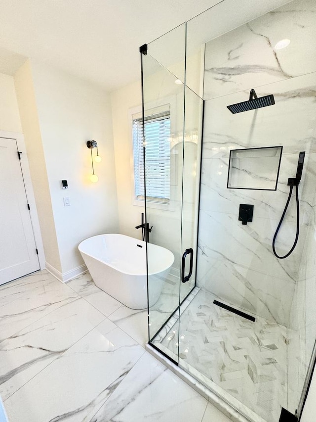 4030 N California Ave Unit 3, Chicago, IL 60618 - full bathroom with a marble finish shower, marble look tiles, and a freestanding bath