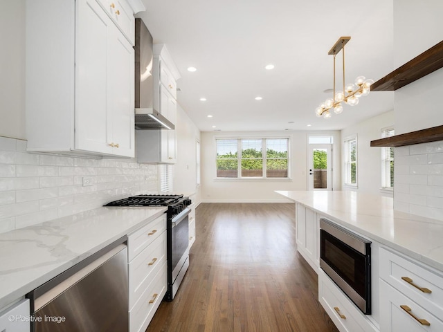 4030 N California Ave Unit 3, Chicago, IL 60618 - kitchen with stainless steel appliances, wall chimney exhaust hood, open shelves, tasteful backsplash, and recessed lighting