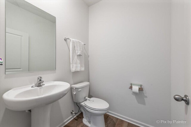 1360 Vineyard Ln, Pingree Grove, IL 60140 - bathroom featuring wood finished floors and toilet