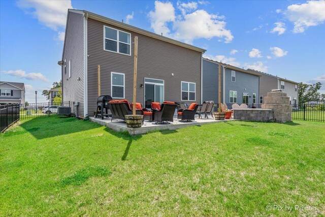 1360 Vineyard Ln, Pingree Grove, IL 60140 - rear view of house with a patio and a fenced backyard