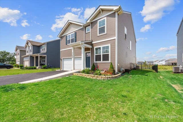 1360 Vineyard Ln, Pingree Grove, IL 60140 - view of front facade with a garage, asphalt driveway, and a front yard
