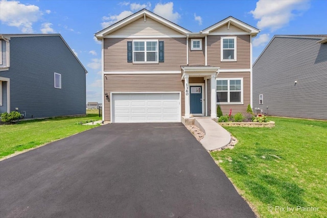 1360 Vineyard Ln, Pingree Grove, IL 60140 - traditional home featuring a garage, asphalt driveway, and a front yard