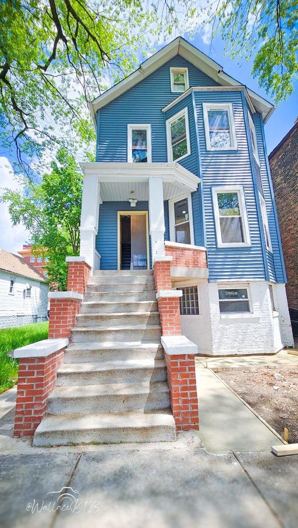 5309 S Bishop St, Chicago, IL 60609 - view of front of house featuring stairs and covered porch