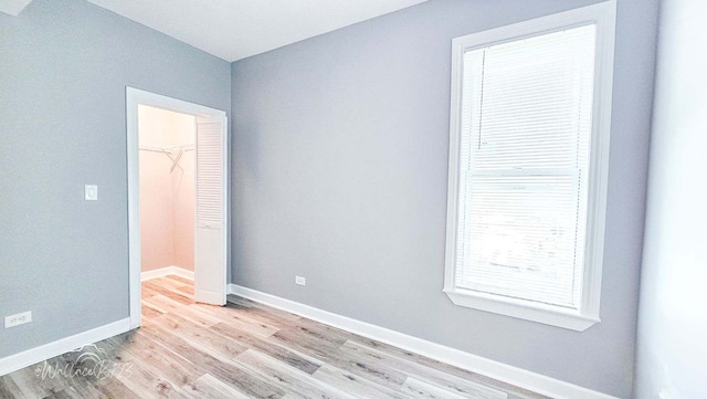 5309 S Bishop St, Chicago, IL 60609 - unfurnished bedroom with light wood-style flooring and baseboards