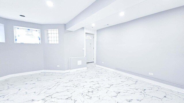 5309 S Bishop St, Chicago, IL 60609 - unfurnished room featuring light marble finish flooring and recessed lighting