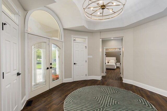 7 Loblolly Ct, Lemont, IL 60439 - foyer featuring wood finished floors, a chandelier, and french doors