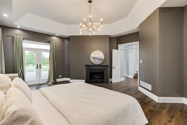 7 Loblolly Ct, Lemont, IL 60439 - bedroom with access to outside, dark wood-style flooring, a chandelier, a raised ceiling, and recessed lighting
