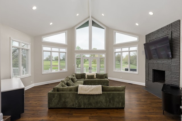 7 Loblolly Ct, Lemont, IL 60439 - living area with healthy amount of natural light, a brick fireplace, high vaulted ceiling, dark wood-style floors, and recessed lighting