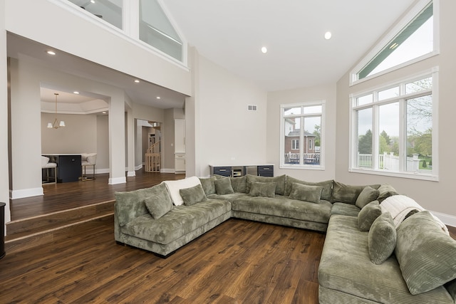 7 Loblolly Ct, Lemont, IL 60439 - living room featuring high vaulted ceiling, dark wood-style flooring, a chandelier, and recessed lighting