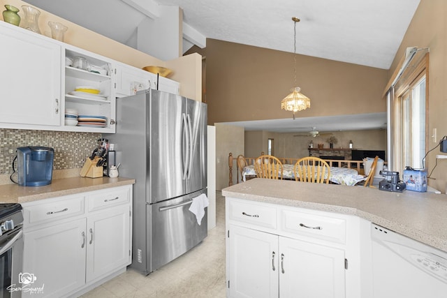 3411 Harris Dr, Joliet, IL 60431 - kitchen featuring appliances with stainless steel finishes, decorative backsplash, white cabinetry, beam ceiling, and a peninsula