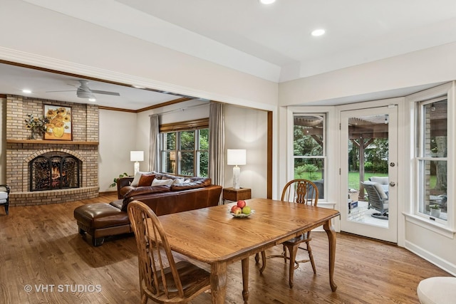 1909 Bridle Ct, Saint Charles, IL 60174 - dining space with wood finished floors, recessed lighting, a brick fireplace, and ceiling fan