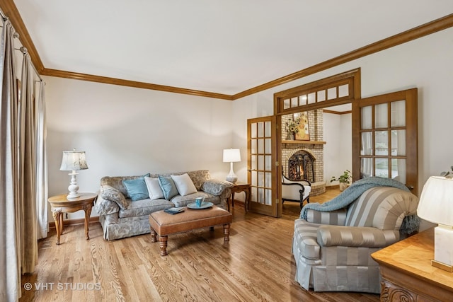 1909 Bridle Ct, Saint Charles, IL 60174 - living area with ornamental molding, a fireplace, and wood finished floors