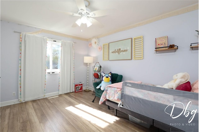 34119 N Hainesville Rd, Round Lake, IL 60073 - bedroom with wood finished floors and a ceiling fan