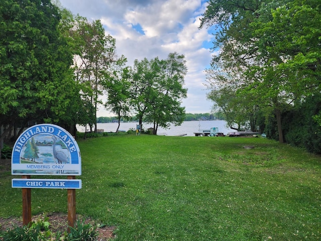 34119 N Hainesville Rd, Round Lake, IL 60073 - surrounding community featuring a water view and a lawn