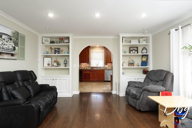 34119 N Hainesville Rd, Round Lake, IL 60073 - living area featuring arched walkways, ornamental molding, dark wood-style floors, built in features, and recessed lighting
