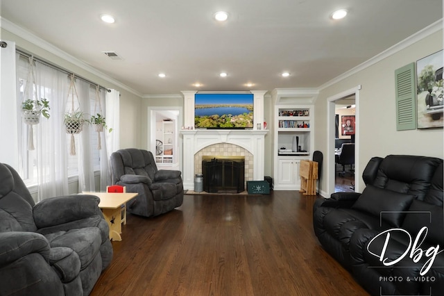 34119 N Hainesville Rd, Round Lake, IL 60073 - living room featuring dark wood-style floors, crown molding, a fireplace, built in features, and recessed lighting