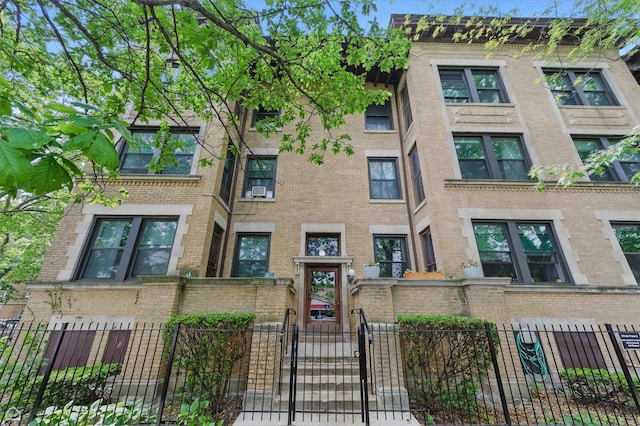 1235 E 53rd St Unit 3, Chicago, IL 60615 - view of apartment building / complex with a fenced front yard