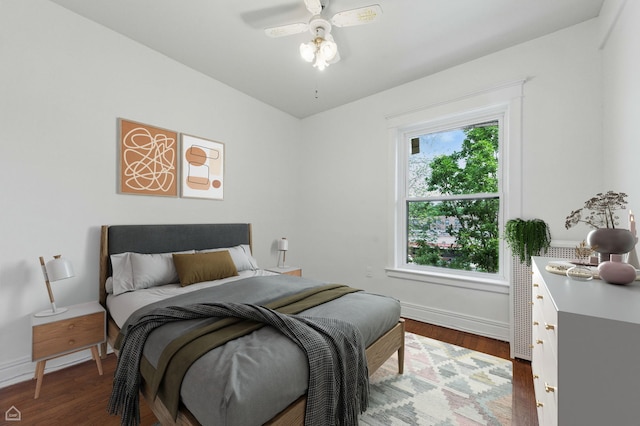 1235 E 53rd St Unit 3, Chicago, IL 60615 - bedroom featuring dark wood-style flooring and a ceiling fan