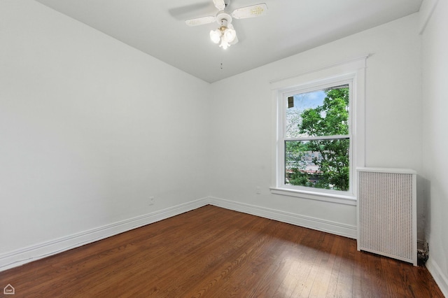 1235 E 53rd St Unit 3, Chicago, IL 60615 - unfurnished room with radiator, hardwood / wood-style flooring, and ceiling fan