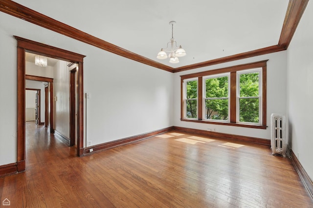 1235 E 53rd St Unit 3, Chicago, IL 60615 - unfurnished room featuring a chandelier, radiator, hardwood / wood-style flooring, and crown molding