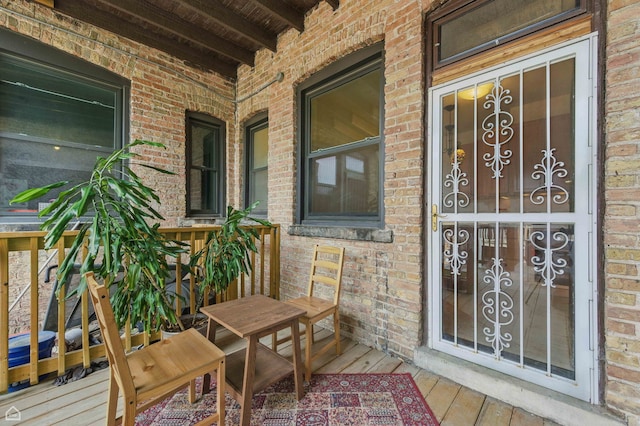 1235 E 53rd St Unit 3, Chicago, IL 60615 - entrance to property featuring covered porch and brick siding