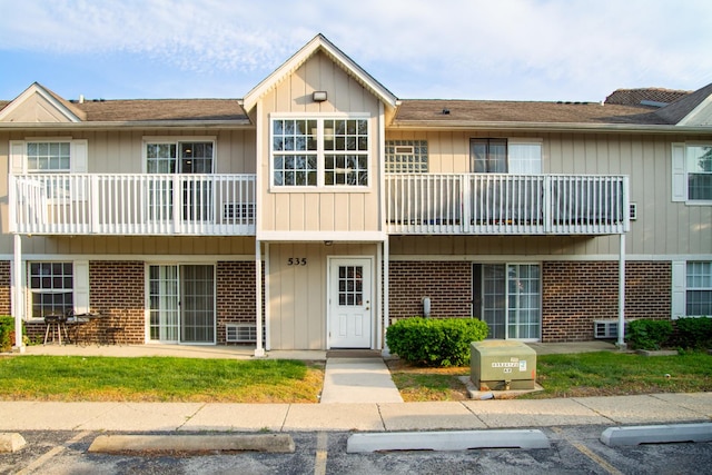 535 E Jefferson St Unit 2C, Bensenville, IL 60106 - view of property featuring uncovered parking