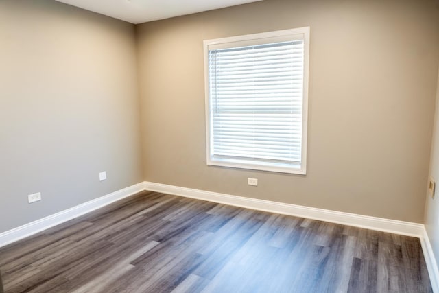 535 E Jefferson St Unit 2C, Bensenville, IL 60106 - spare room featuring dark wood-style floors