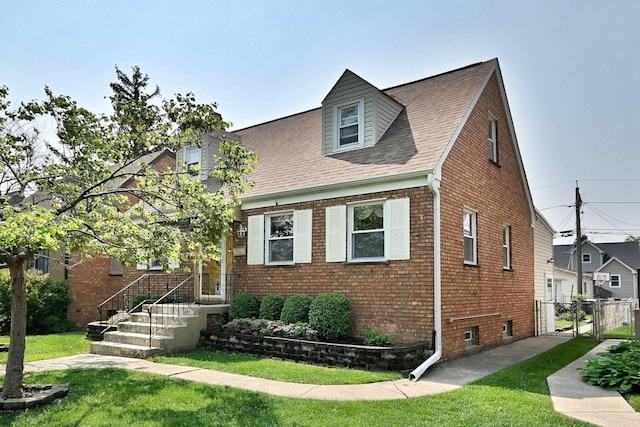 7931 W Metropole St, Elmwood Park, IL 60707 - view of front of property featuring brick siding, a gate, and a shingled roof