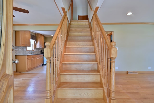 7931 W Metropole St, Elmwood Park, IL 60707 - staircase with wood finished floors, crown molding, recessed lighting, and ceiling fan
